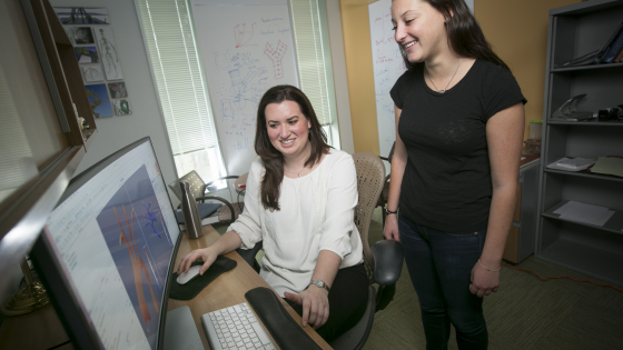 Professor Amanda Randles works with undergraduate student Stephanie Musinsky.