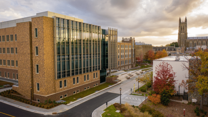 aerial view of the Wilkinson Building, Telcom Drive and the tower of Duke Chapel at Duke University