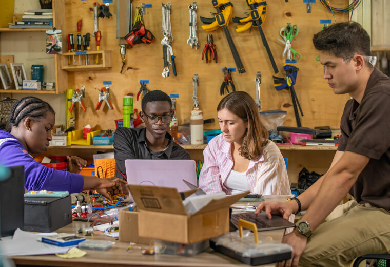four students in a makerspace